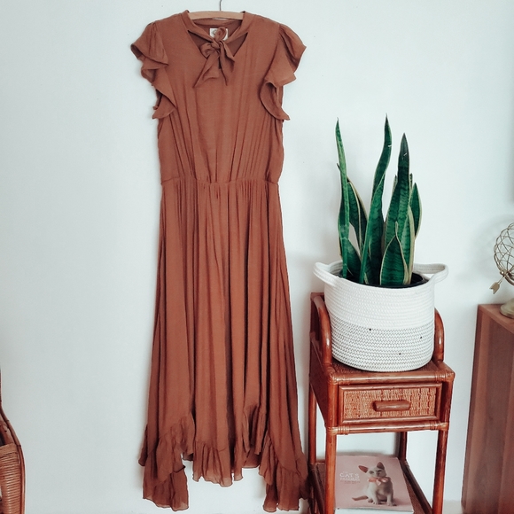 Mia Joy Dresses & Skirts - Mia Joy flutter sleeve Peasant dress